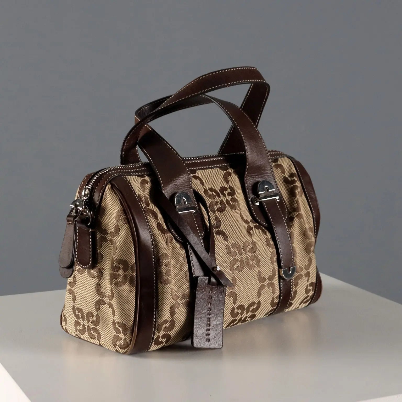 Coccinelle Trunk Leather Monogram Canvas Second Hand Italy - Leather and Monogram Canvas | Clothing | Summer Accessories