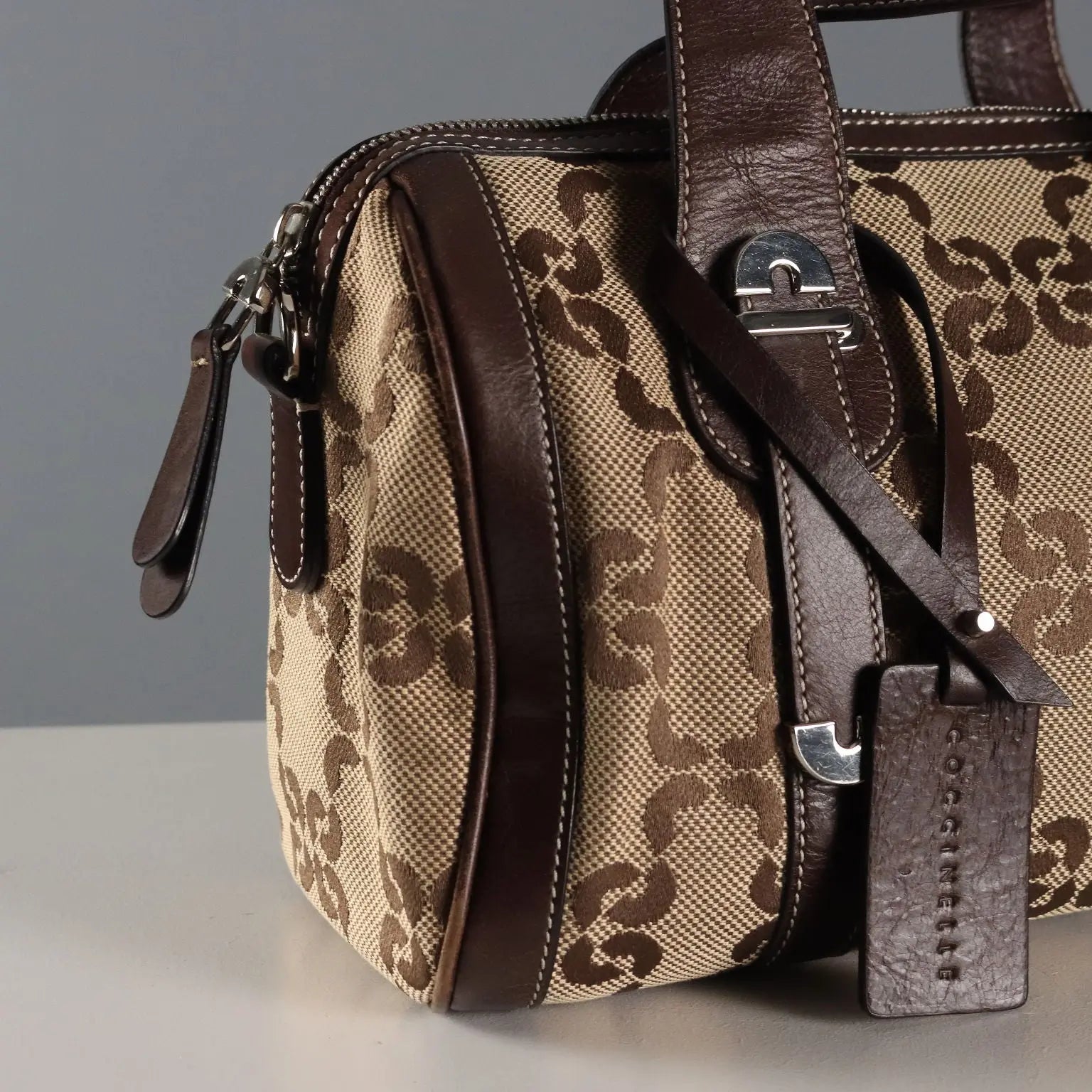 Coccinelle Trunk Leather Monogram Canvas Second Hand Italy - Leather and Monogram Canvas | Clothing | Summer Accessories