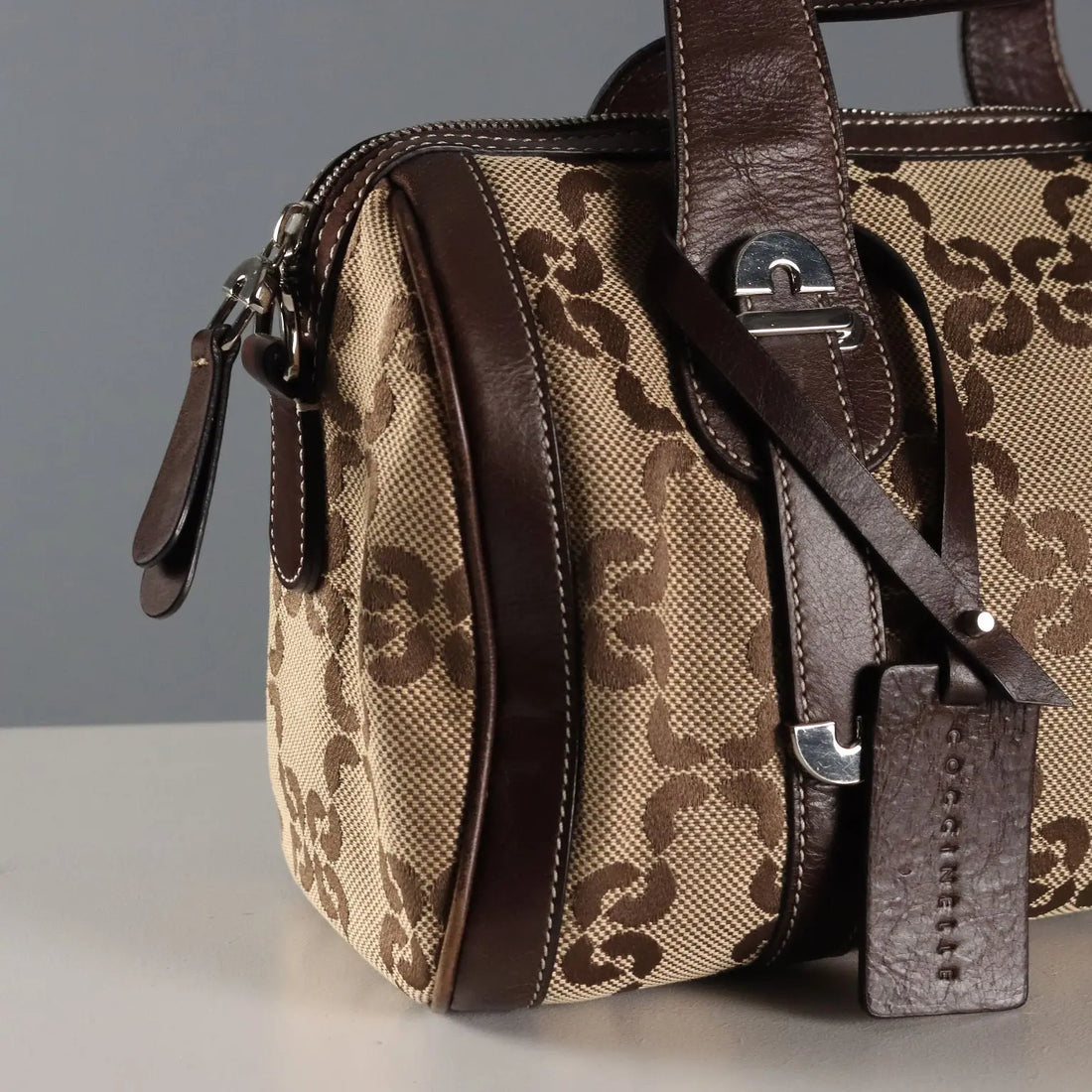Coccinelle Trunk Leather Monogram Canvas Second Hand Italy - Leather and Monogram Canvas | Clothing | Summer Accessories