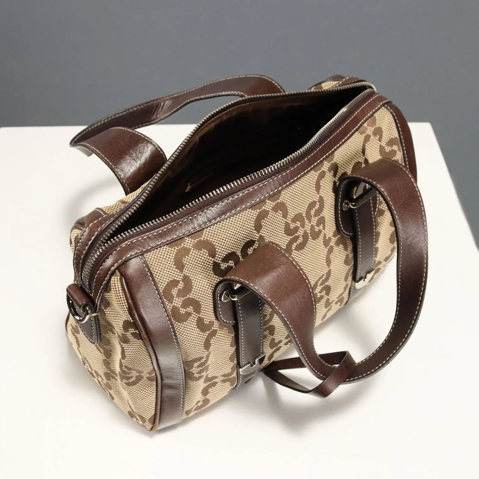 Coccinelle Trunk Leather Monogram Canvas Second Hand Italy - Leather and Monogram Canvas | Clothing | Summer Accessories