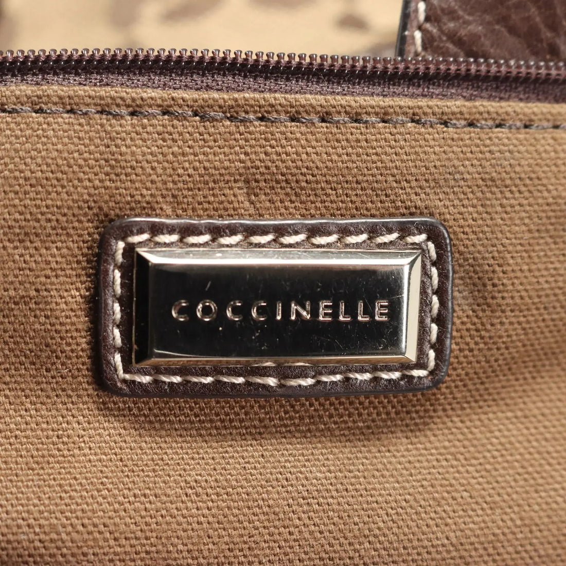 Coccinelle Trunk Leather Monogram Canvas Second Hand Italy - Leather and Monogram Canvas | Clothing | Summer Accessories