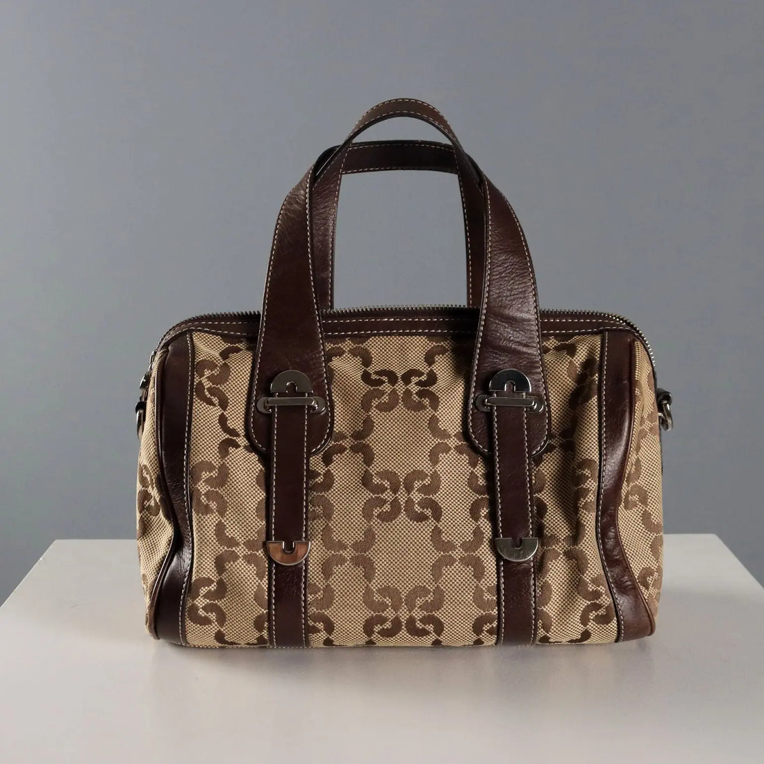Coccinelle Trunk Leather Monogram Canvas Second Hand Italy - Leather and Monogram Canvas | Clothing | Summer Accessories