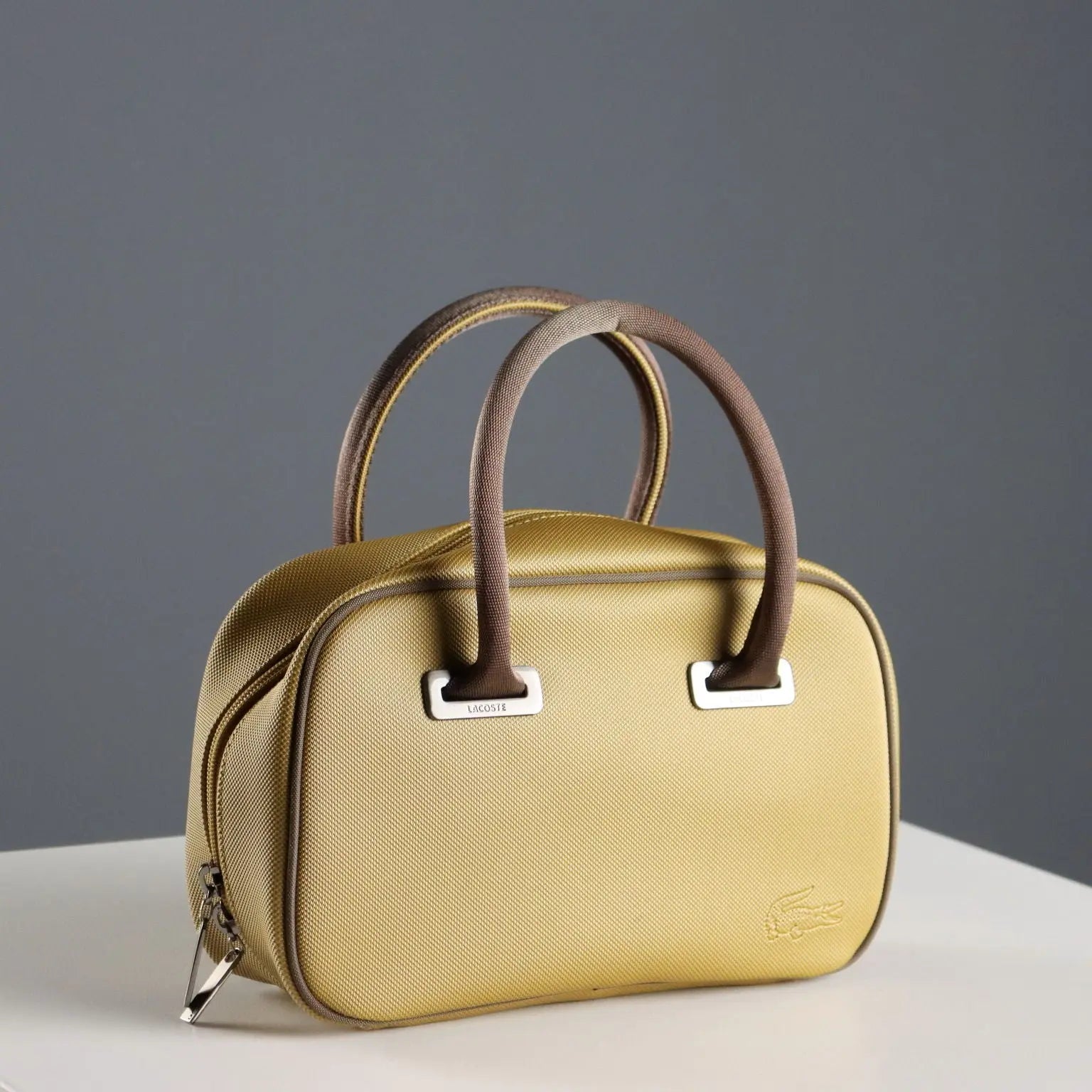 Lacoste Mini Bag L61 PVC Mustard France Second Hand | Clothing & House Linens | Second hand