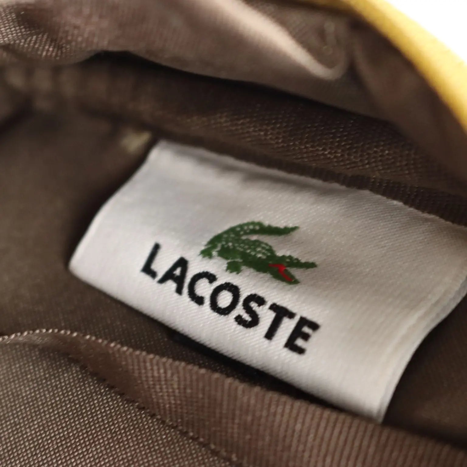Lacoste Mini Bag L61 PVC Mustard France Second Hand | Clothing & House Linens | Second hand