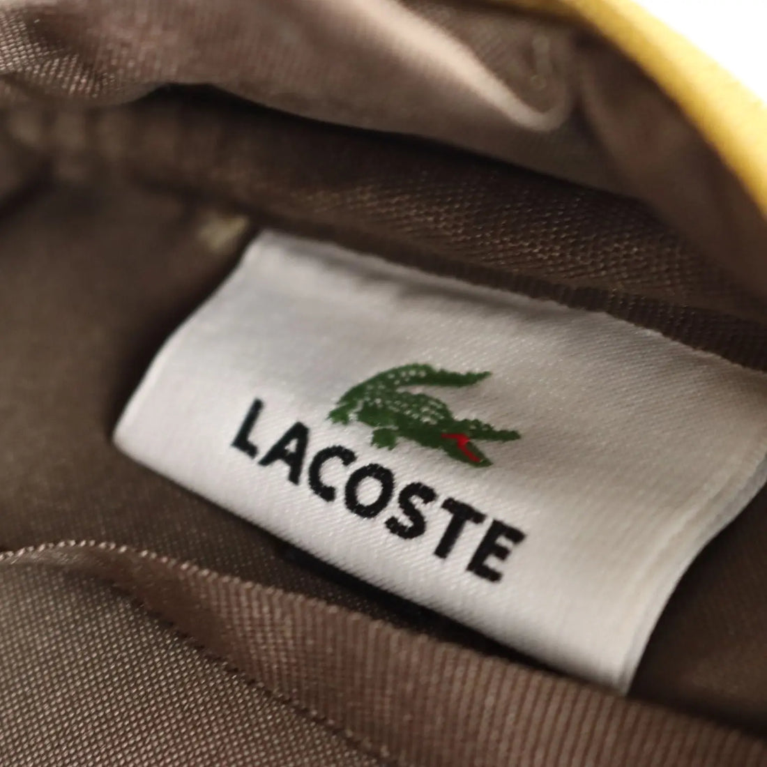Lacoste Mini Bag L61 PVC Mustard France Second Hand | Clothing & House Linens | Second hand
