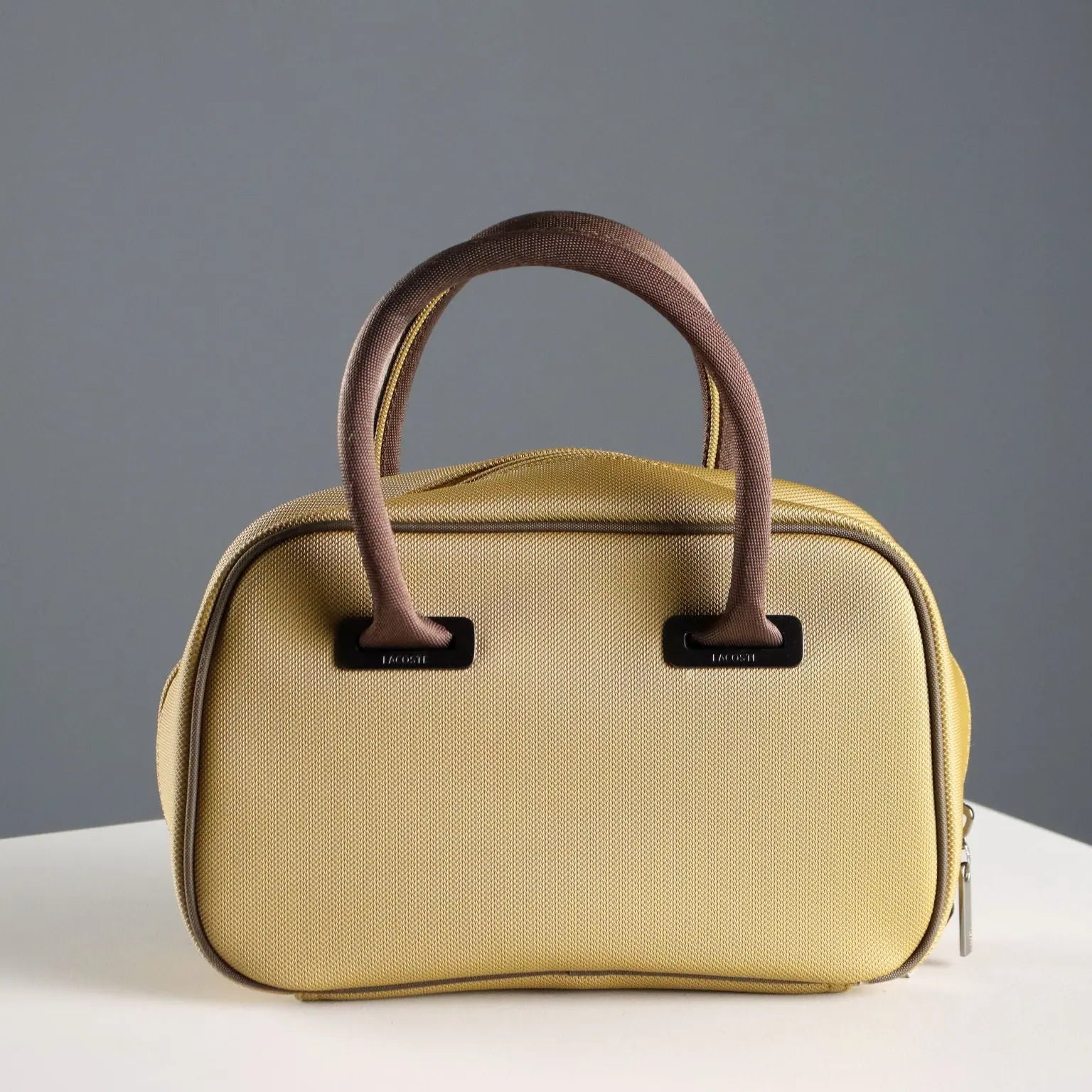 Lacoste Mini Bag L61 PVC Mustard France Second Hand | Clothing & House Linens | Second hand