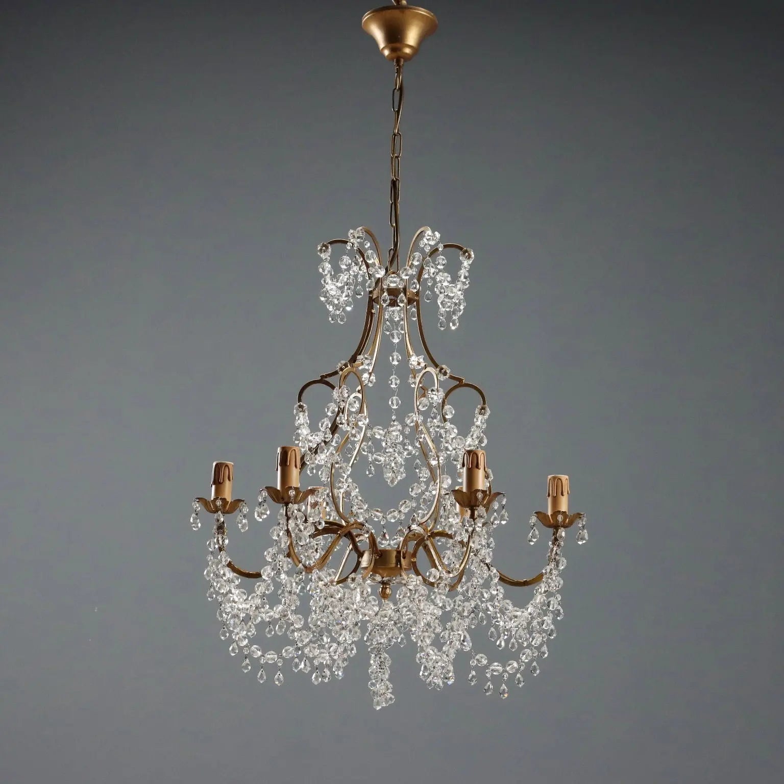 Antique Chandelier Gilded Iron and Metal Italy XX Century
