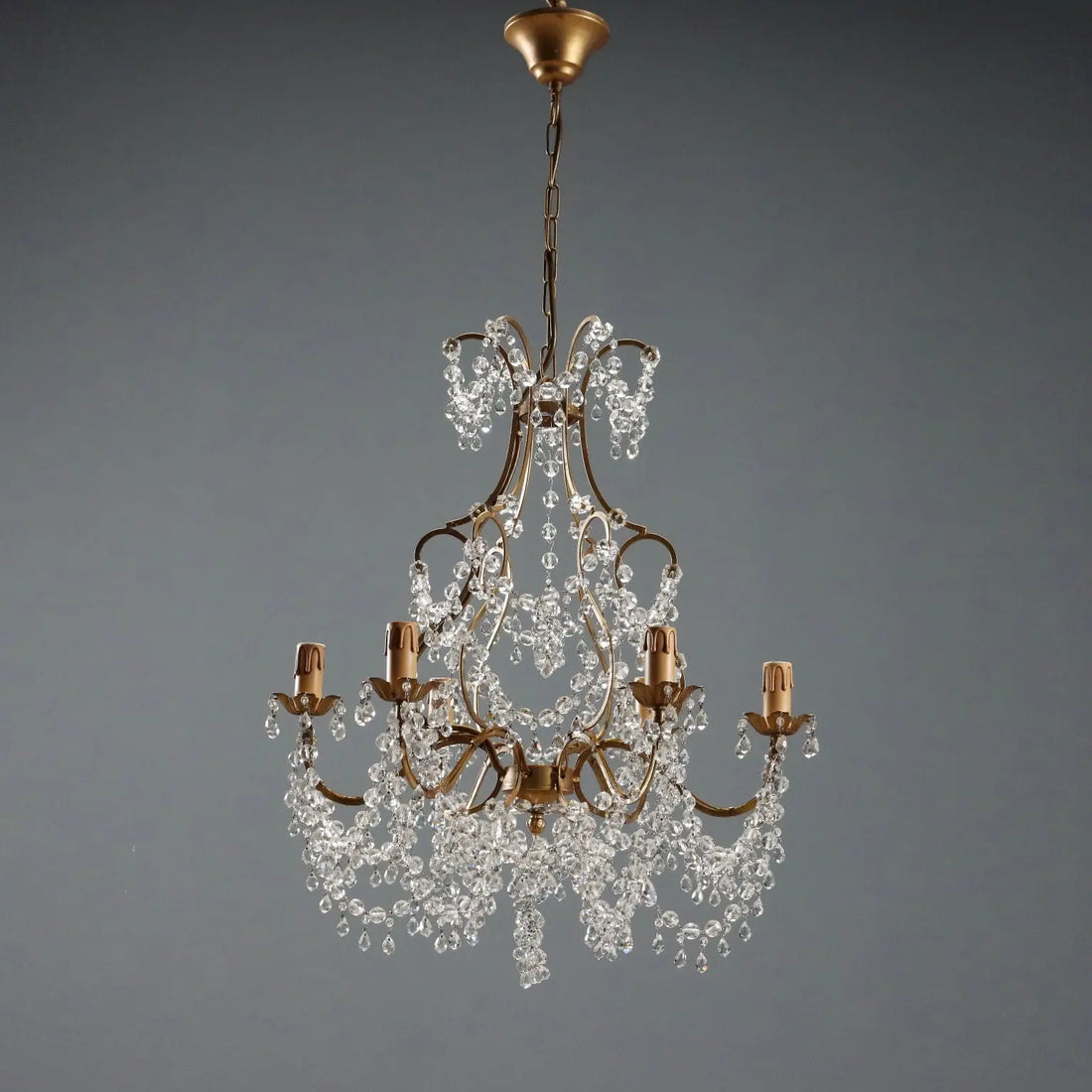Antique Chandelier Gilded Iron and Metal Italy XX Century