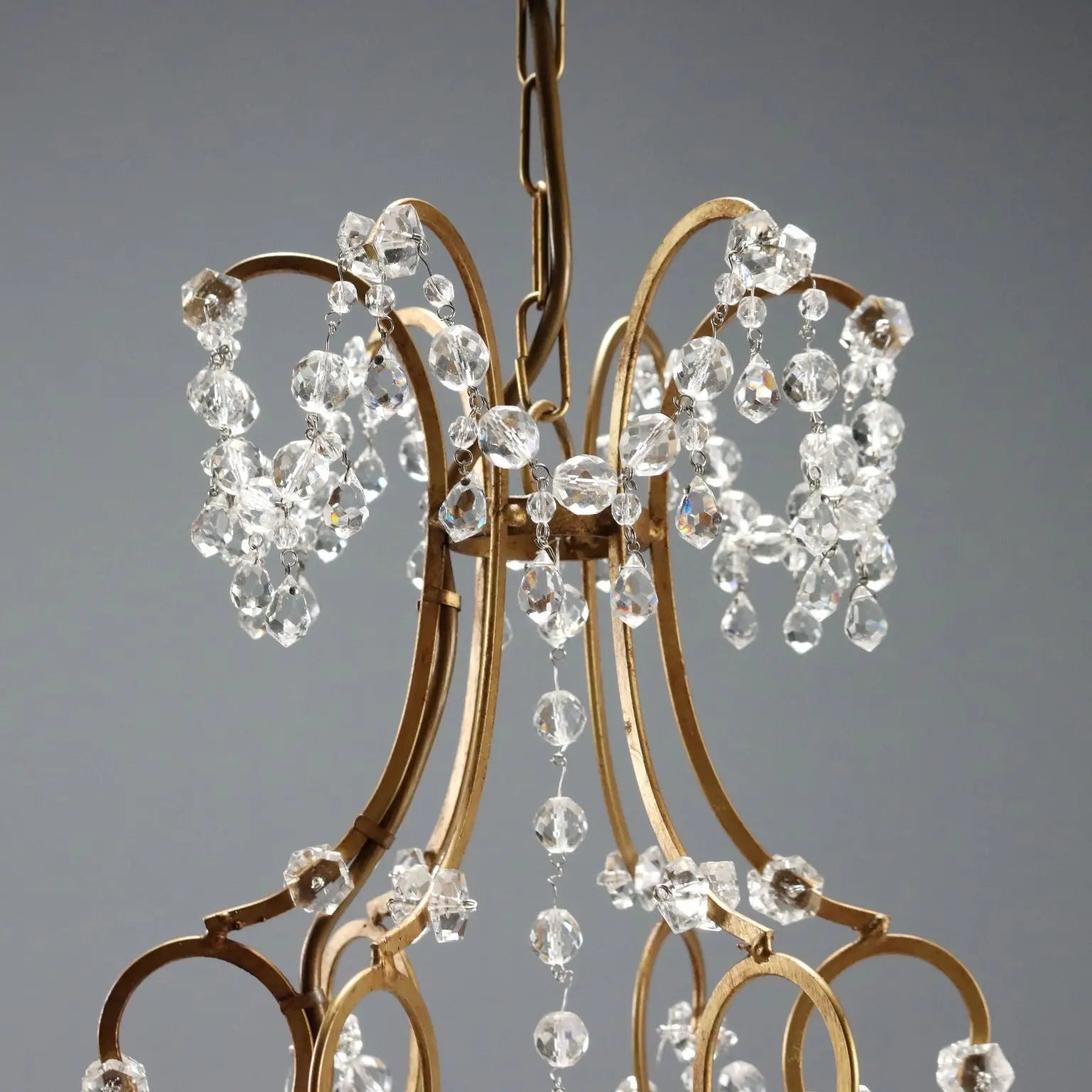 Antique Chandelier Gilded Iron and Metal Italy XX Century