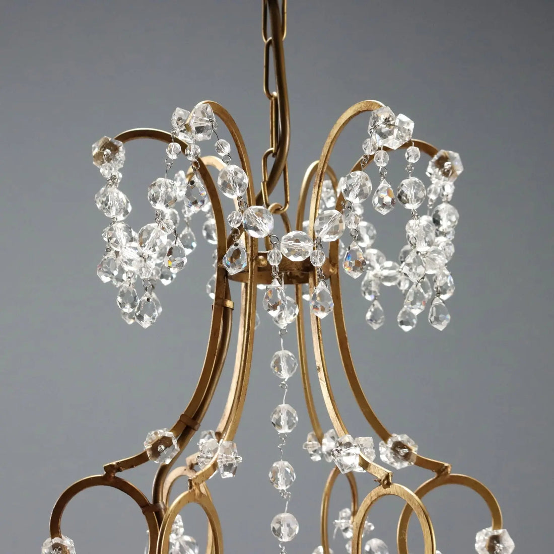 Antique Chandelier Gilded Iron and Metal Italy XX Century