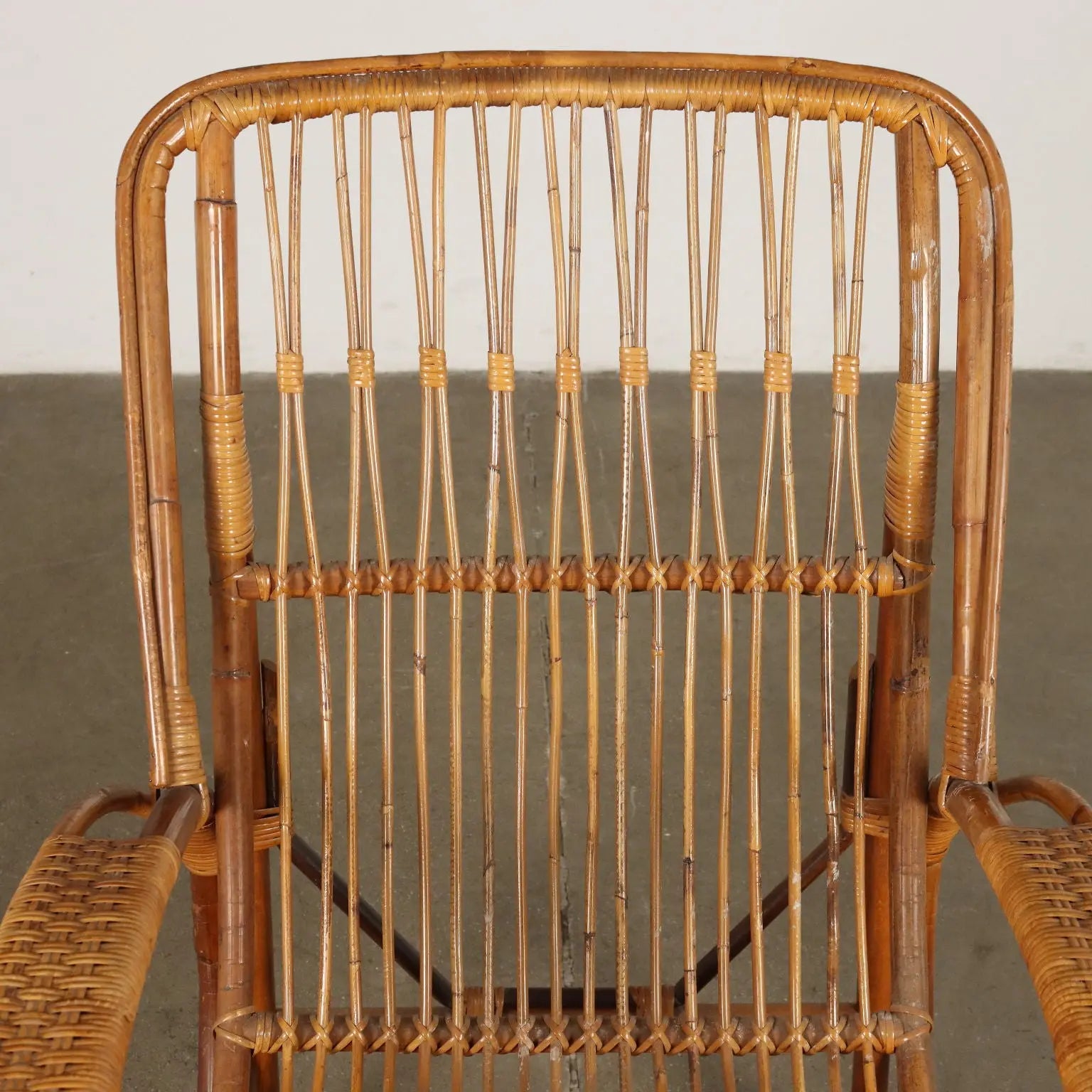 Vintage 1960s Armchair with Magazine Rack Wicker Italy | Modernism | Armchairs